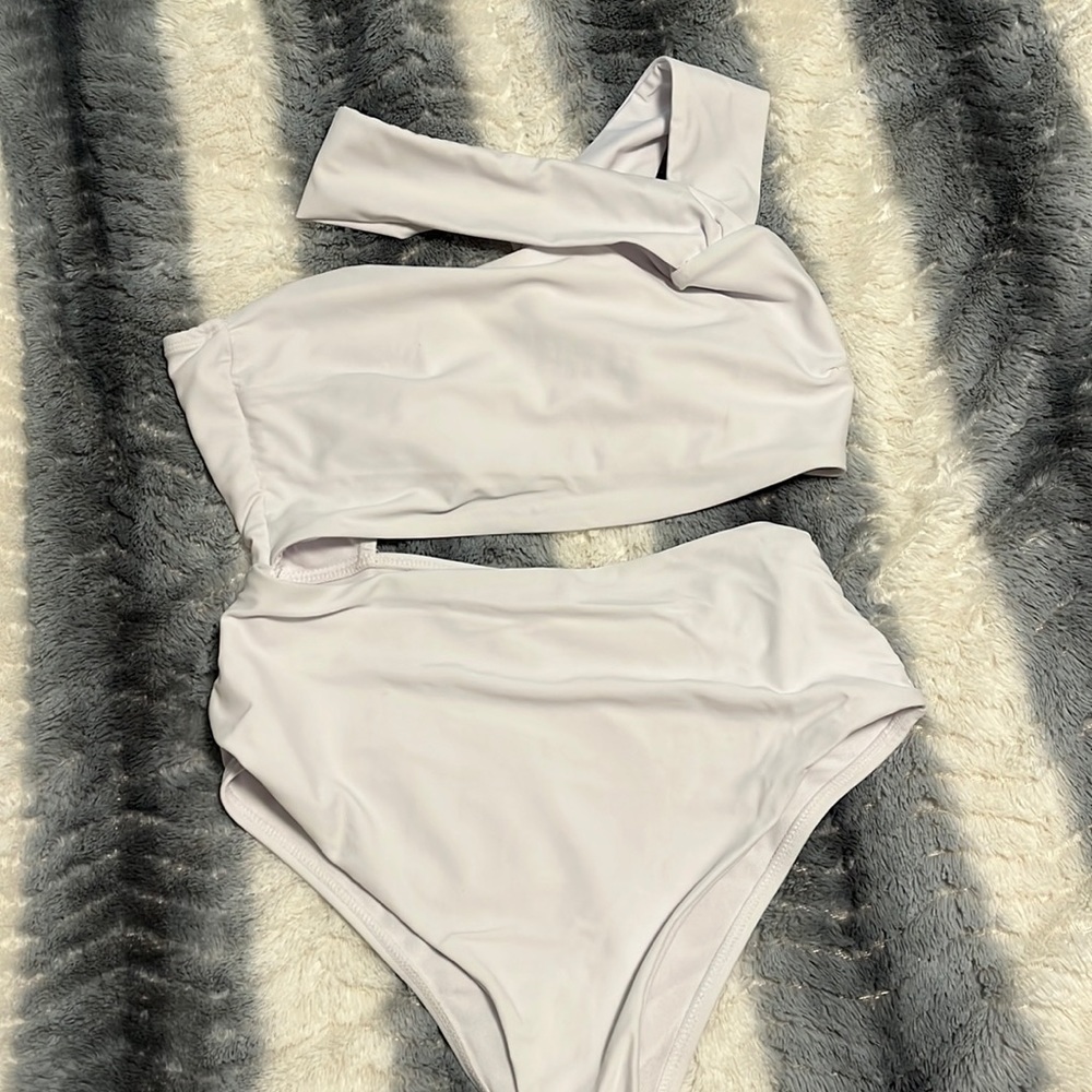 White asymmetrical suit one shoulder